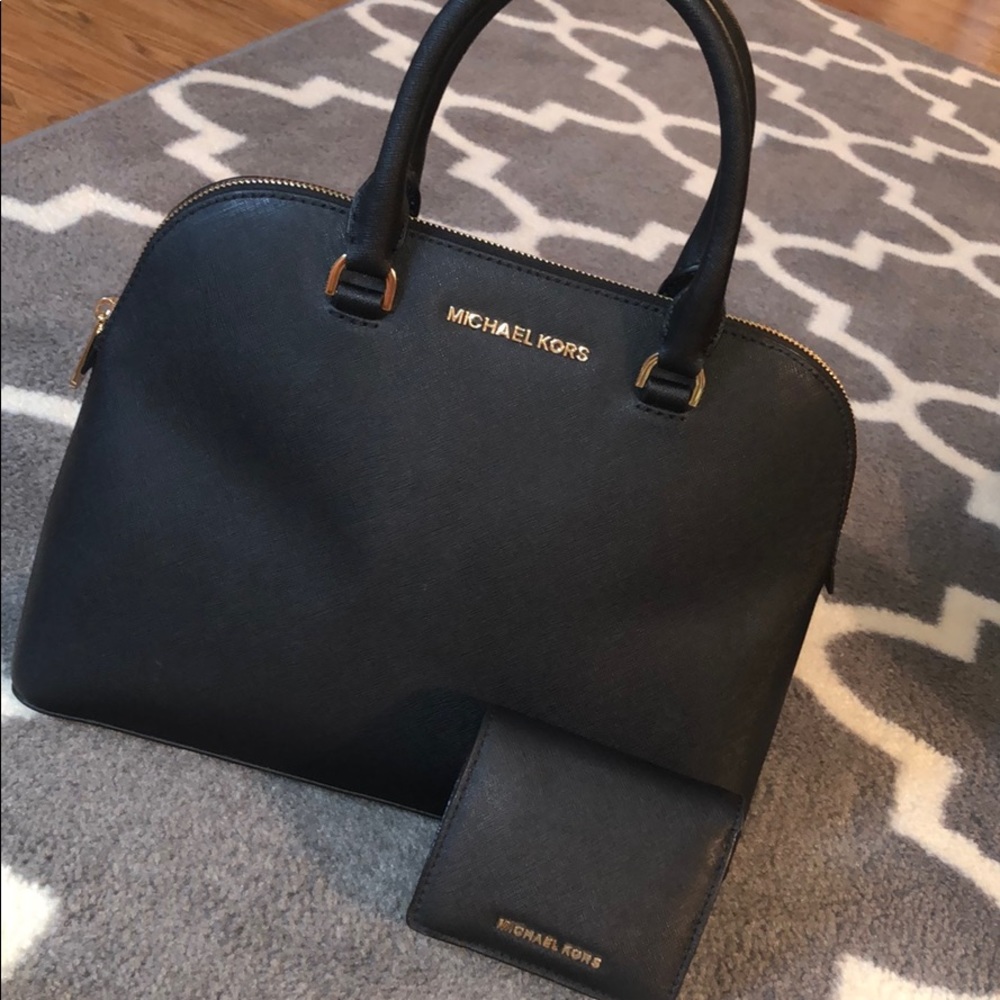 Matching black Michael Kors satchel and wallet